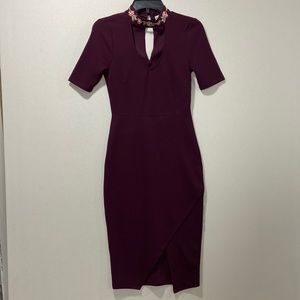 Size small burgundy ‘body con’ dress. Brand: Almost Famous